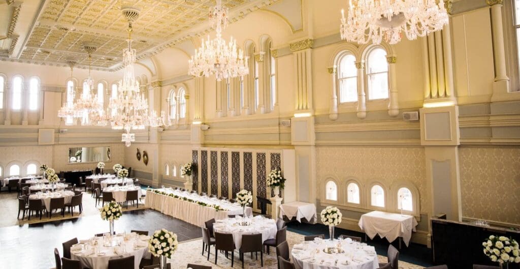 Queen Victoria Building Tea Room wedding venue with tall ceilings and chandeliers